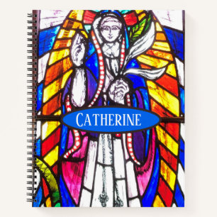 Cuaderno Diseño de vidrio emplomado con figura religiosa.
