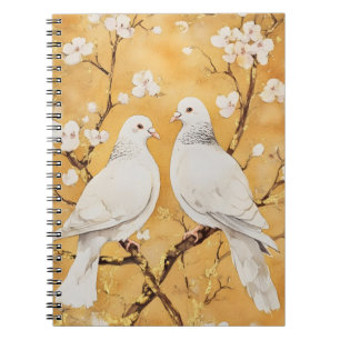 Cuaderno dos palomas blancas posadas en una rama