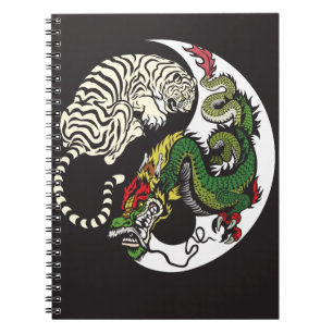 Cuaderno dragón verde y símbolo blanco de yang del yin de