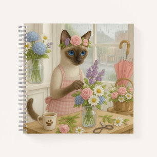 Cuaderno El gato arreglando flor en floristería