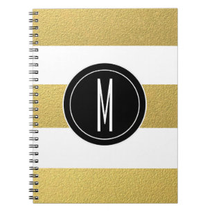 CUADERNO EL RELIEVE METALIZADO DORADO RAYA EL MONOGRAMA