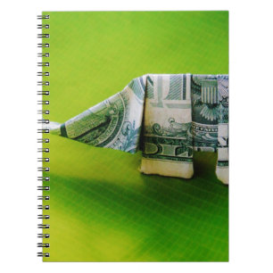 Cuaderno Elefante del origami de la factura del dólar sobre