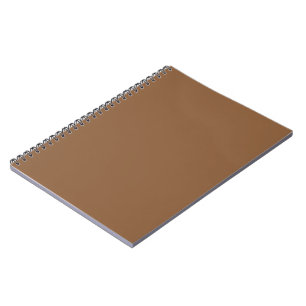 Cuaderno Elevar el diseño con un fondo marrón