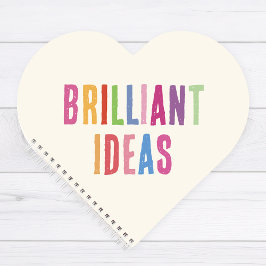 Cuaderno en espiral de corazón con ideas brillante