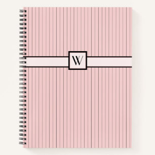 Cuaderno en espiral rosa con rayas negras finas