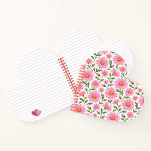 Cuaderno en forma de corazón con flores de margari