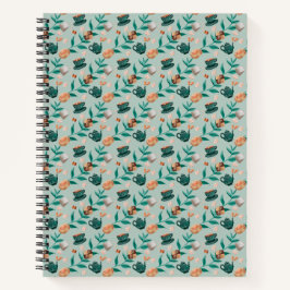 Cuaderno encuadernado en espiral con un patrón flo