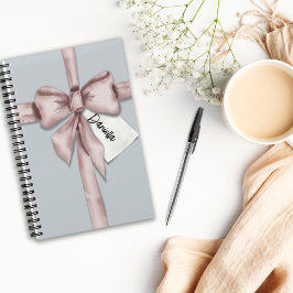 Cuaderno Envuelto en un arco rosa
