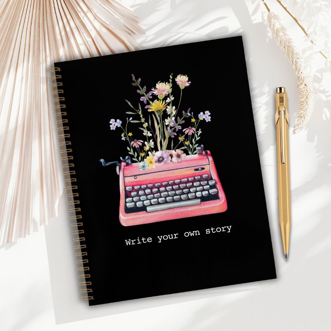 Cuaderno Escritores para portátiles, negros escriben tu pro (Writers Notebook, Black cover with floral typewriter artwork and the text "Write your own story")