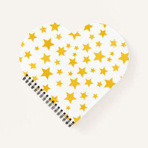 Cuaderno estrellas amarillas sobre fondo blanco