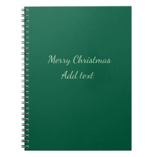 Cuaderno Feliz Navidad verde plano fondo solo vacaciones
