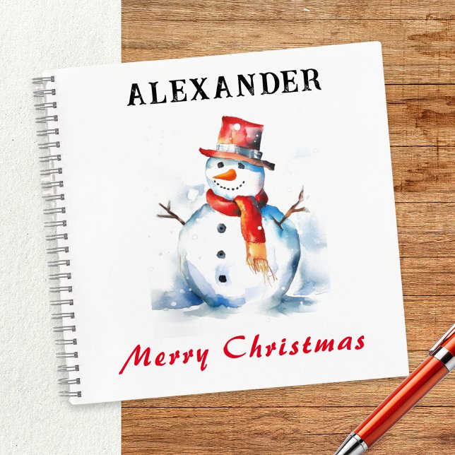 Cuaderno Fiesta de imágenes de Navidad con muñeco de nieve, (A festive spiral-bound notebook with snowman design, to personalize with a name)
