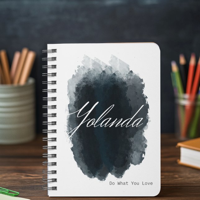 Cuaderno Firma manuscrita negrita (“Notebook with bold script signature across center, navy watercolor ink smear, and inspiring quote.”)