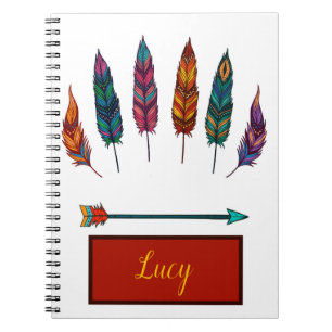Cuaderno flecha y plumas