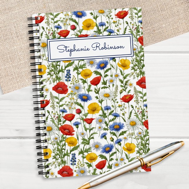 Cuaderno Flores silvestres coloridas Hermosa floral persona (A pretty notebook with colorful wildflowers pattern, personalized with a name in script typography)