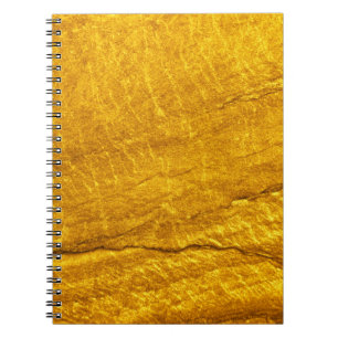 Cuaderno Fondo de textura de piedra dorada. abstracto, anti
