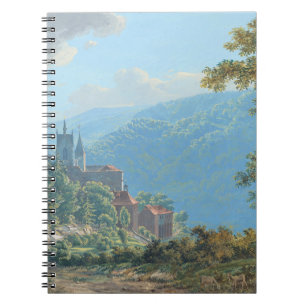 Cuaderno Fortaleza en paisaje montañoso al amanecer