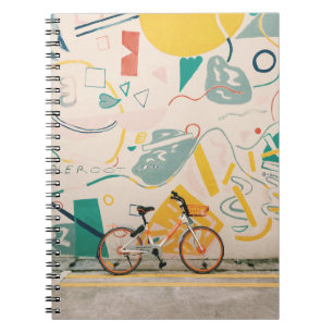 CUADERNO FOTOGRAFÍA DE BICICLETA BLANCA Y NARANJA