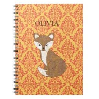 Cuaderno Fox lindo en fondo modelado naranja