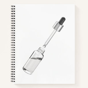 Cuaderno Frasco de gafas de vidrio abierto con pipeta