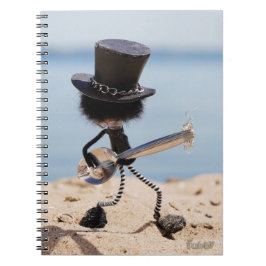 Cuaderno Fubby rock gitarist met hoed op het strand.