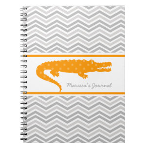 Cuaderno Gator naranja en un portátil personalizado de Chev