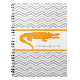 Cuaderno Gator naranja en un portátil personalizado de Chev