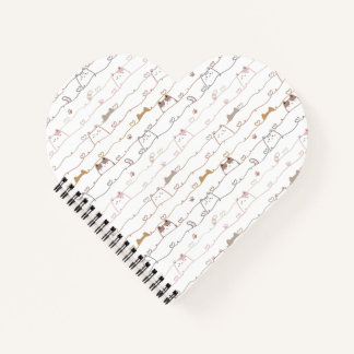 Cuaderno Gatos adorables asomándose sobre corazones