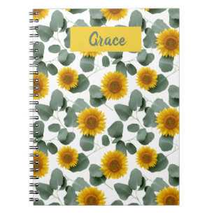 Cuaderno Girasoles con patrón de hojas de eucalipto persona