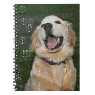 Cuaderno Golden retriever que coge burbujas