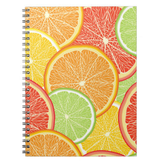 Cuaderno Grapefruit y fondo abstracto naranja.