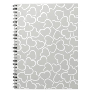 CUADERNO GRIS CON CORAZONES DE AMOR ESQUEMADOS EN BLANCO
