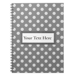 Cuaderno gris y blanco del texto de encargo del