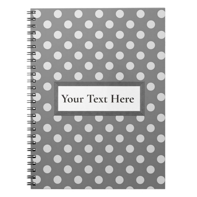 Cuaderno gris y blanco del texto de encargo del (Frente)