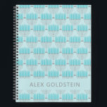 Cuaderno Hanukkah Menorah Blue Personalized Kids Nombre<br><div class="desc">Este cuaderno festivo presenta un patrón menorah repetido en azul brillante y gris sobre un suave fondo azul cielo, perfecto para celebrar el espíritu de Hanukkah. La parte delantera incluye espacio para un nombre personalizado en tipografía limpia y moderna. Ideal como regalo de vacaciones para niños, estudiantes o cualquier persona...</div>