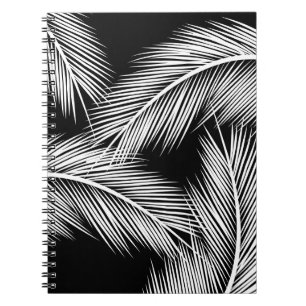 Cuaderno Hojas blancas de palma en el fondo de color negro