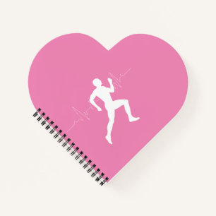 Cuaderno Hombre corriendo una silueta sobre fondo rosado