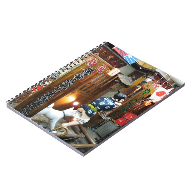 Cuaderno Humor japonés - Perro sacando pantalones (Lado Izquierdo)