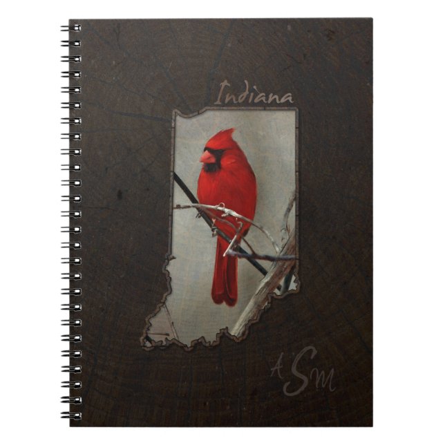 Cuaderno Indiana cardinal cortada en el fondo de madera (Frente)