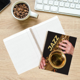 Cuaderno Jazzman juega al saxofón del oro