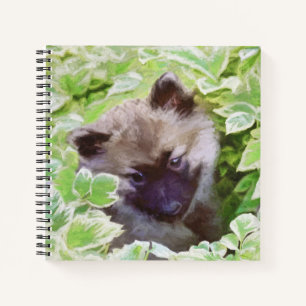 Cuaderno Keeshond Puppy en el jardín pintando arte original