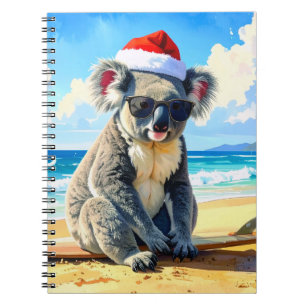 Cuaderno Koala de sol y olas con sombrero de Santa en una N