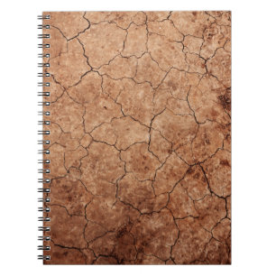 Cuaderno La erosión árida rajada rompe el desierto