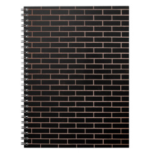 Cuaderno La pared de ladrillo negro oscuro tiene una superf