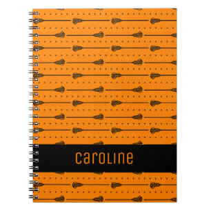 Cuaderno Lacrosse naranja palos negros y líneas punteadas