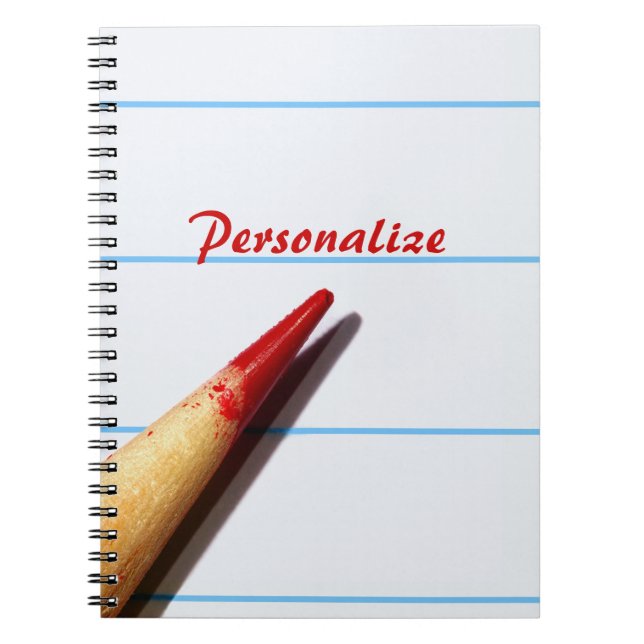 Cuaderno Lápiz rojo del profesor en el papel alineado con (Frente)