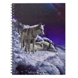 Cuaderno Lobos grises en la nieve de invierno de noche