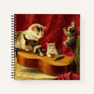 Cuaderno Madre gata y gatitos jugando con guitarra