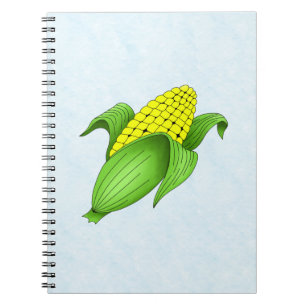 Cuaderno Maíz sobre la mazorca con un portátil Bkgd azul