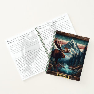 Cuaderno Majestuoso alce al borde de un sereno río de monta